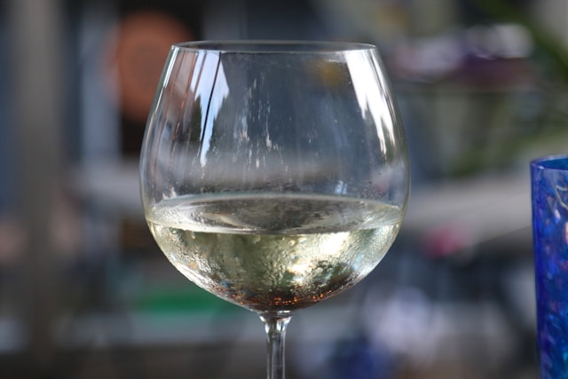 Calypso-complimentary-bar-wine Selection of chilled local wines and refreshments served on the traditional wooden deck of Calypso during a Mykonos cruise.